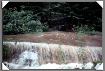 Water flowing OVER a bridge